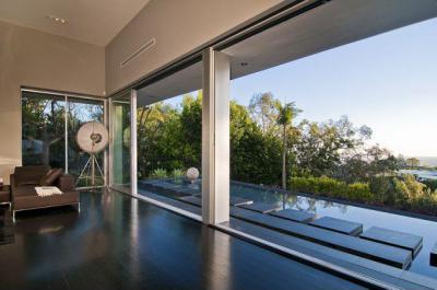 Teraszra nyitott nappali - nappali ötlet, modern stílusban