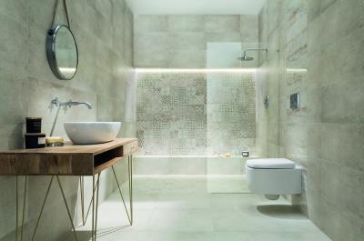 Tágas, elegáns fürdőszoba pasztell szürke burkolattal - fürdő / WC ötlet, modern stílusban