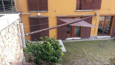 Kitekerhető napvitorla - kert / udvar ötlet, modern stílusban